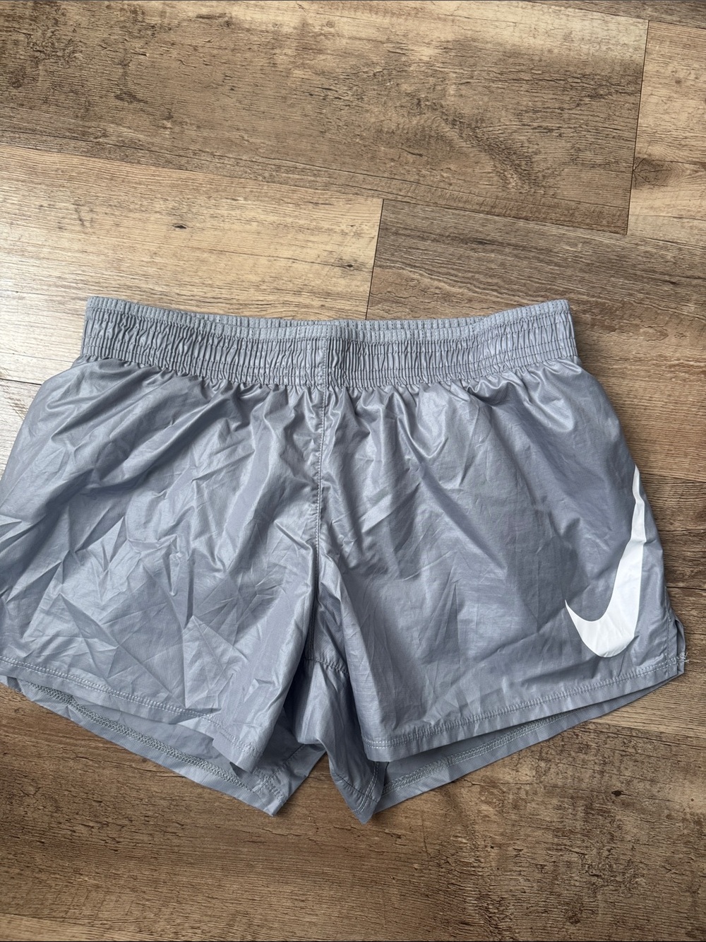 Nike Light Gray Women's Athletic Shorts with White Swoosh